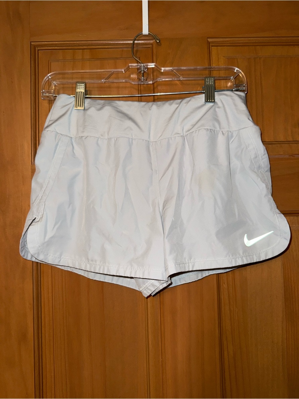 Nike Women's Light Gray Athletic Shorts with Reflective Swoosh